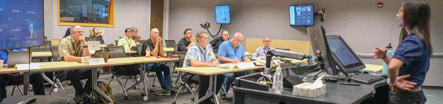 UofM teacher with students - Copy - Copy